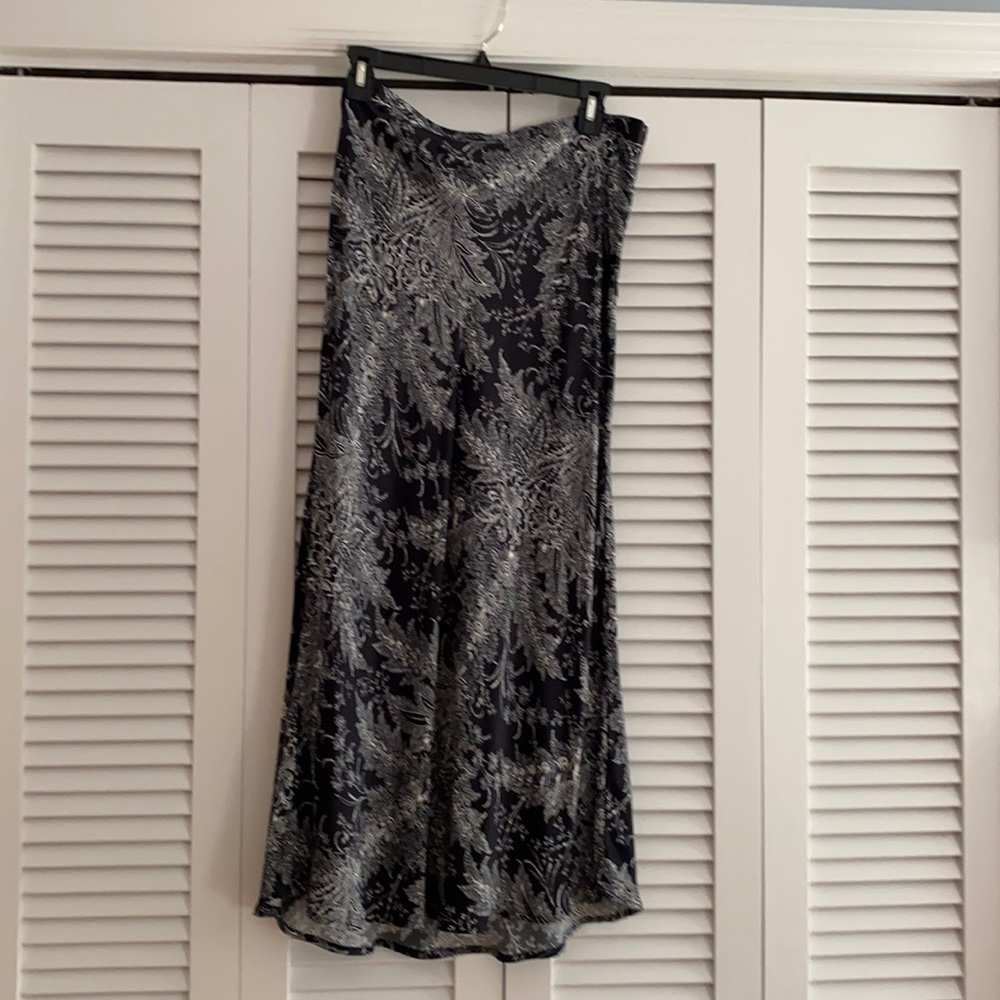 Deep navy blue skirt with white floral pattern.